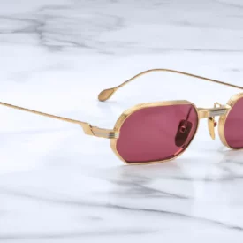 Sunglasses Model The Sidewalk Doctor in Gold with Magenta lenses in collaboration with Enfants Riches Déprimés for Jacques Marie Mage