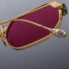 Sunglasses Model The Sidewalk Doctor in Gold with Magenta lenses in collaboration with Enfants Riches Déprimés for Jacques Marie Mage