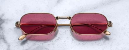 Sunglasses Model The Sidewalk Doctor in Gold with Magenta lenses in collaboration with Enfants Riches Déprimés for Jacques Marie Mage