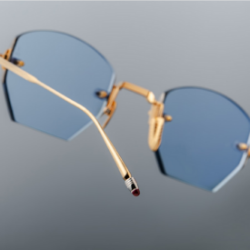 Sunglasses model Oatman in color Gold with Star Blue lenses from Jacques Marie Mage