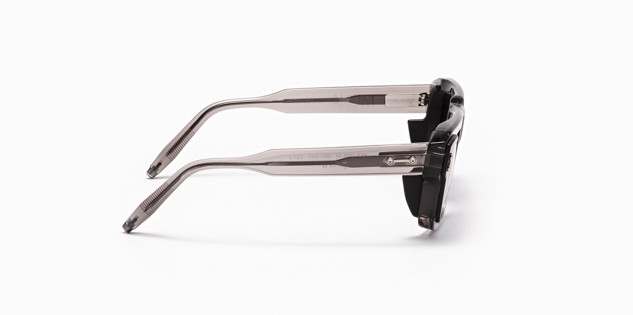 Sunglasses Model Hercules in Color Dark Crystal Grey with dark grey gradient lenses from Akoni