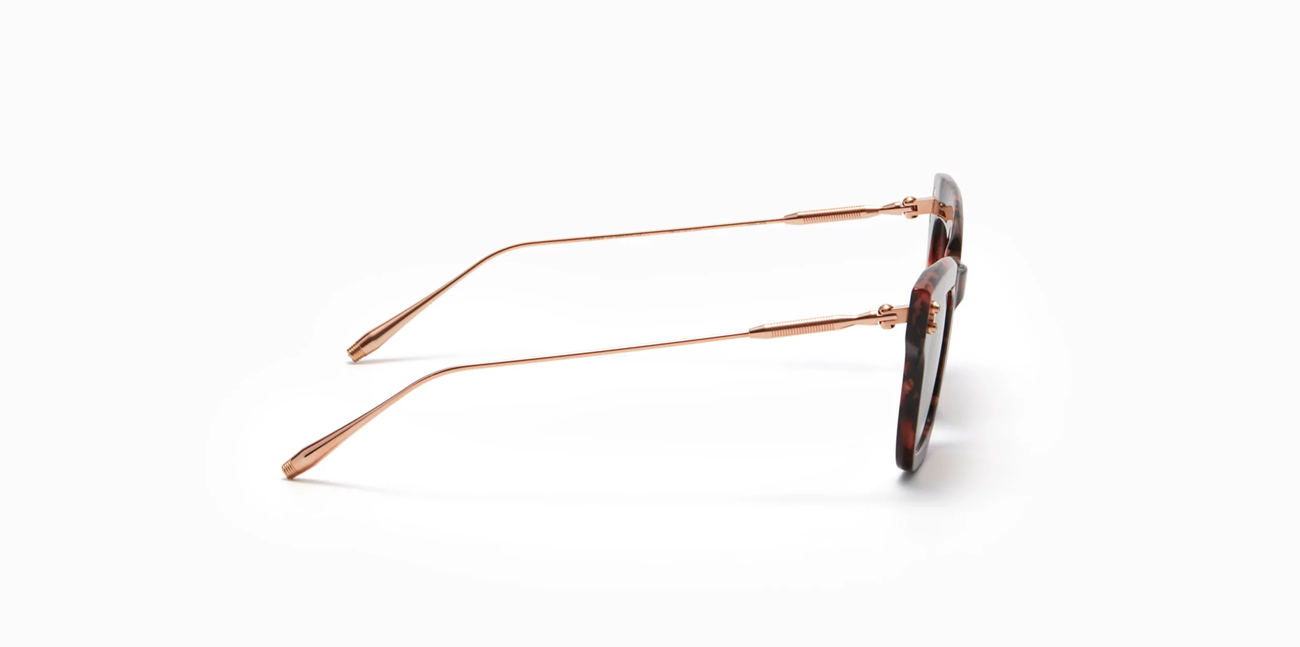 Sunglasses Model Innes in color Brown Pink Swirl with dark brown gradient lenses from Akoni