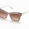 Sunglasses Model Innes in color Nude Grey Swirl with dark brown gradient lenses from Akoni