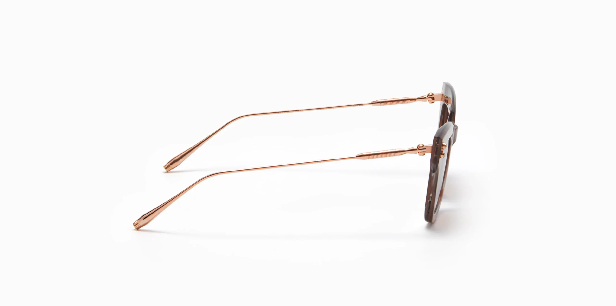 Sunglasses Model Innes in color Nude Grey Swirl with dark brown gradient lenses from Akoni