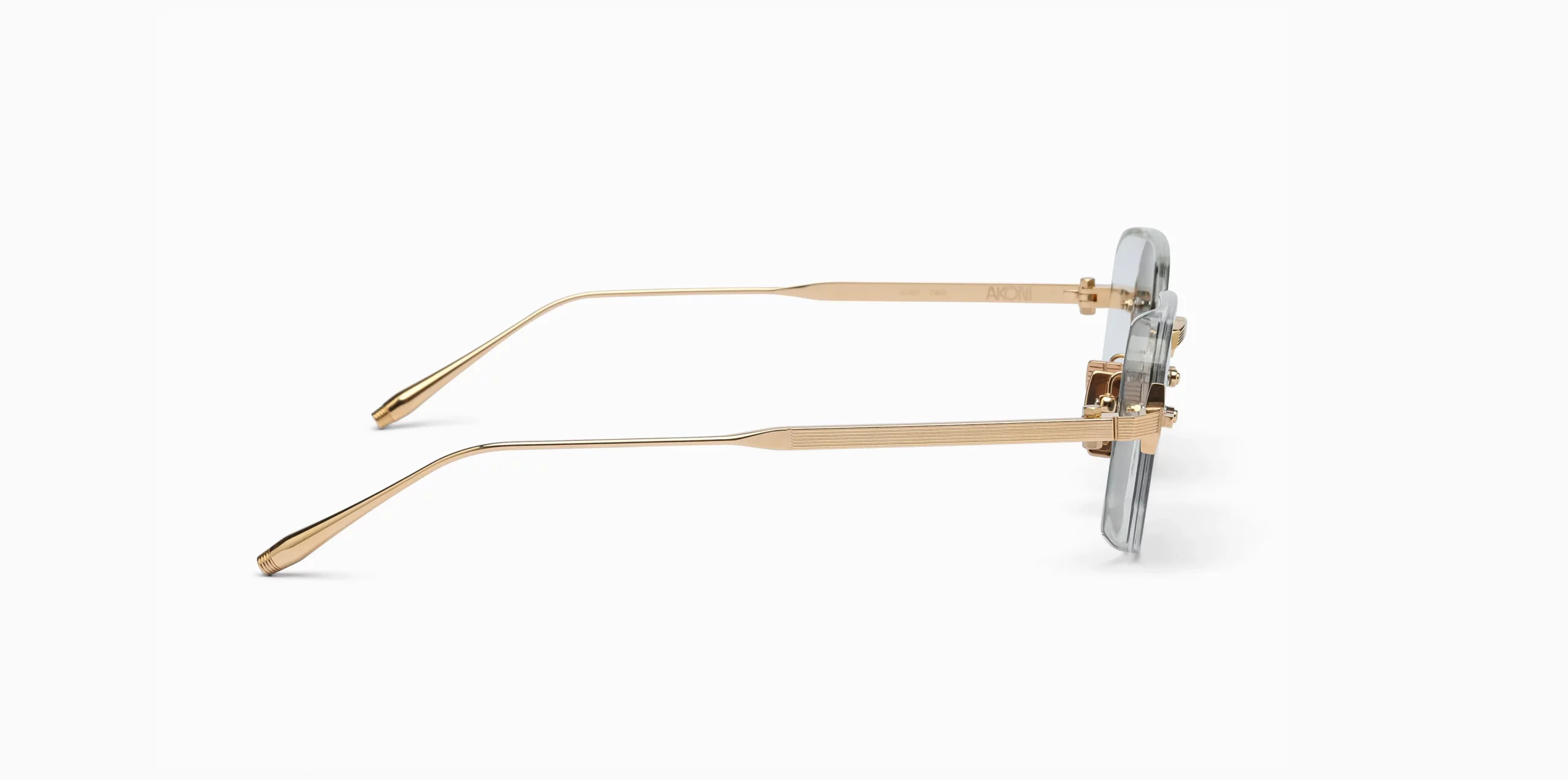 Sunglasses Model June-Two in Color Crystal Clear with deep emerald green lenses from Akoni