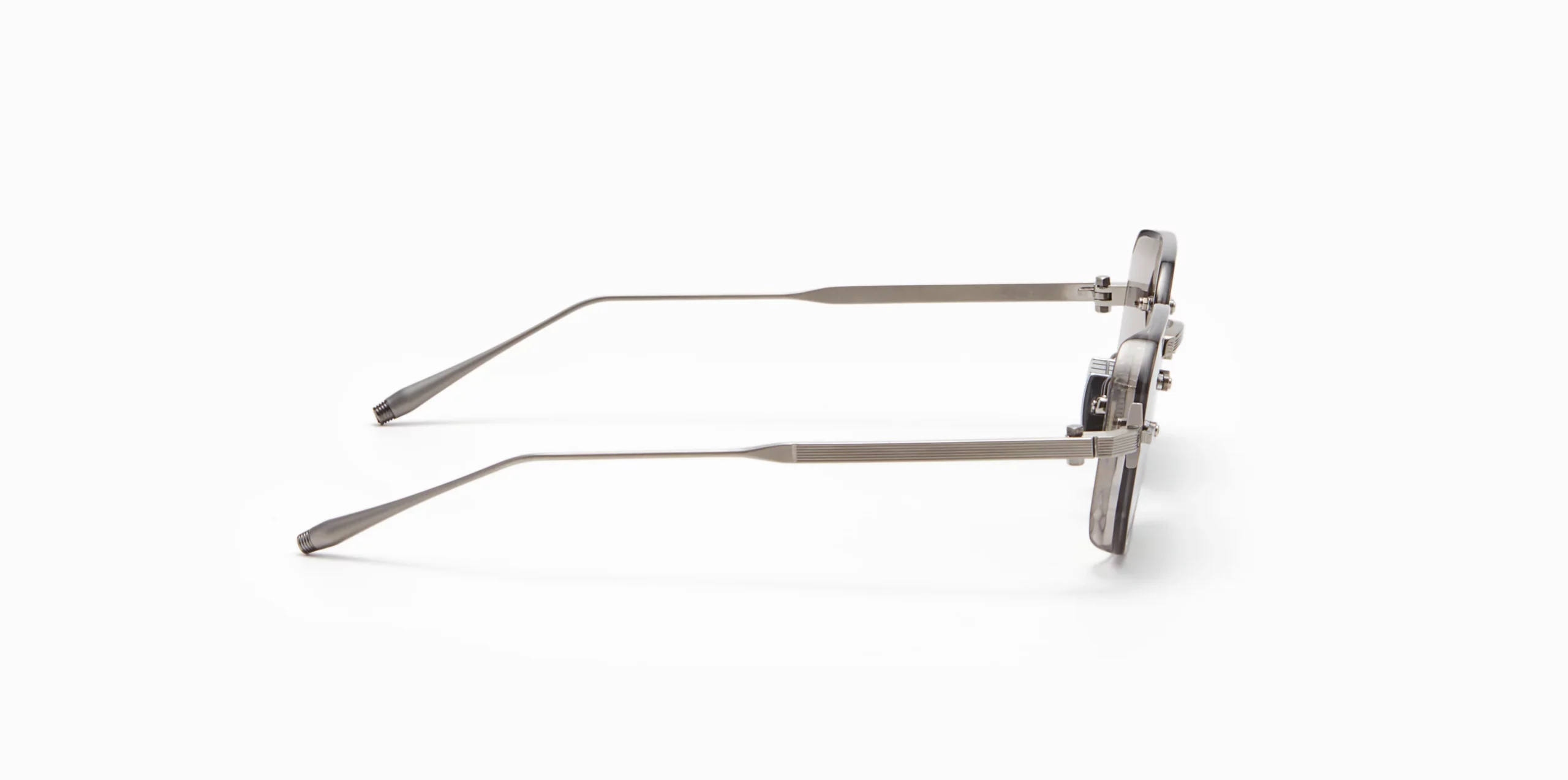 Sunglasses Model June-Two in color Dark Crystal Grey with dark grey to olive lenses from Akoni