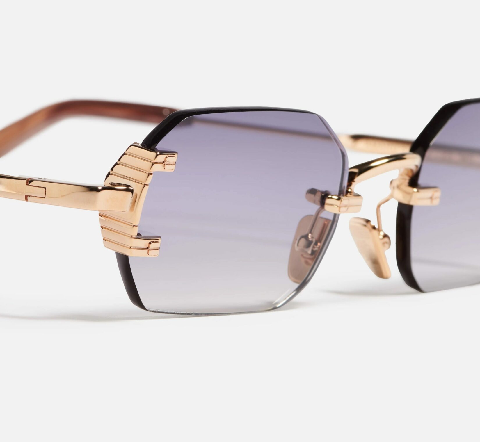 Sunglasses Model Amaru in Color C511 with Grey gradient lenses from John Dalia