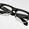 Sunglasses Model Cash in color BlackFade with Light Bottle Green Lenses from Jacques Marie Mage