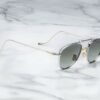 Sunglasses Model Flynn in Color Electrum with Light Blottle Green Lenses from Jacques Marie Mage