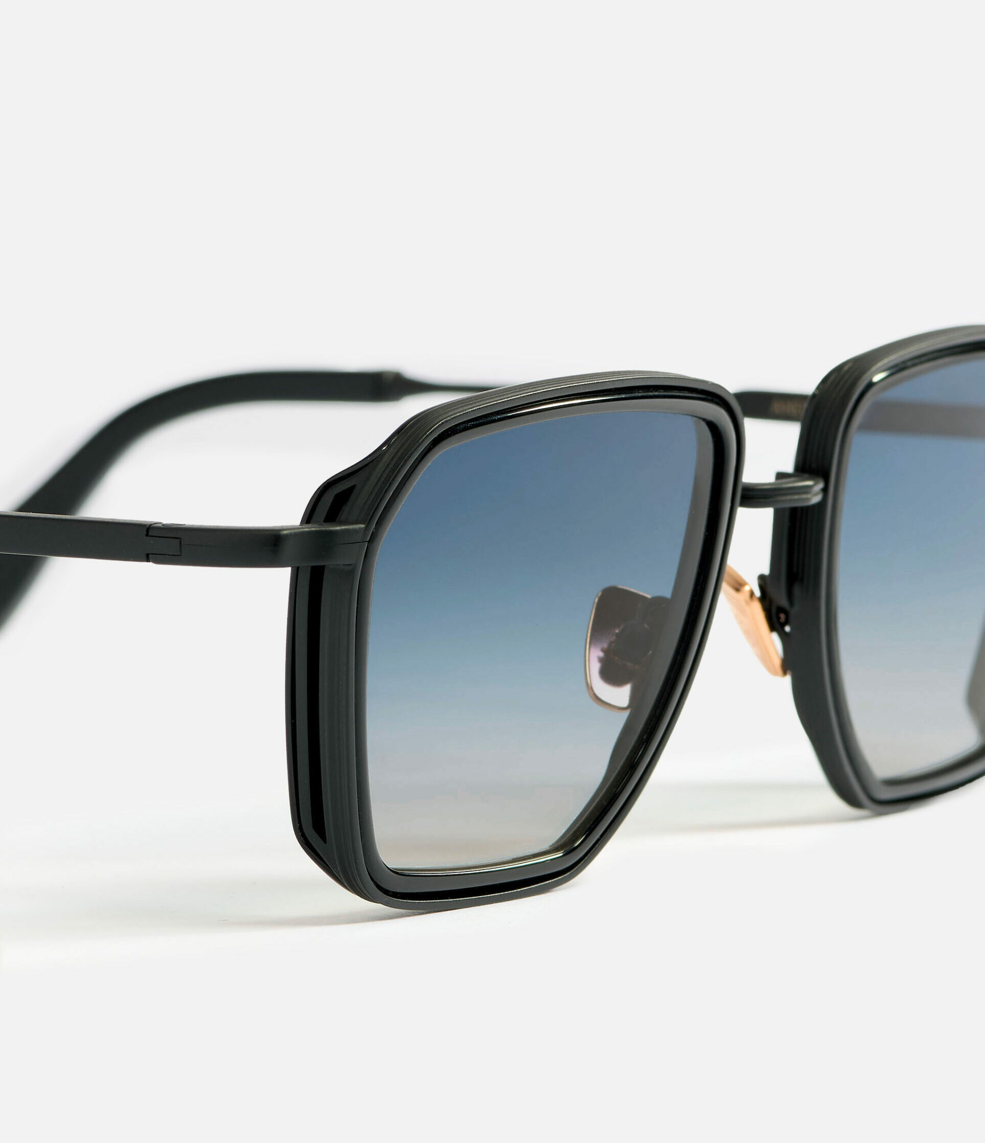 Sunglasses Model André 2.0 in C303 with light blue gradient lenses from John Dalia