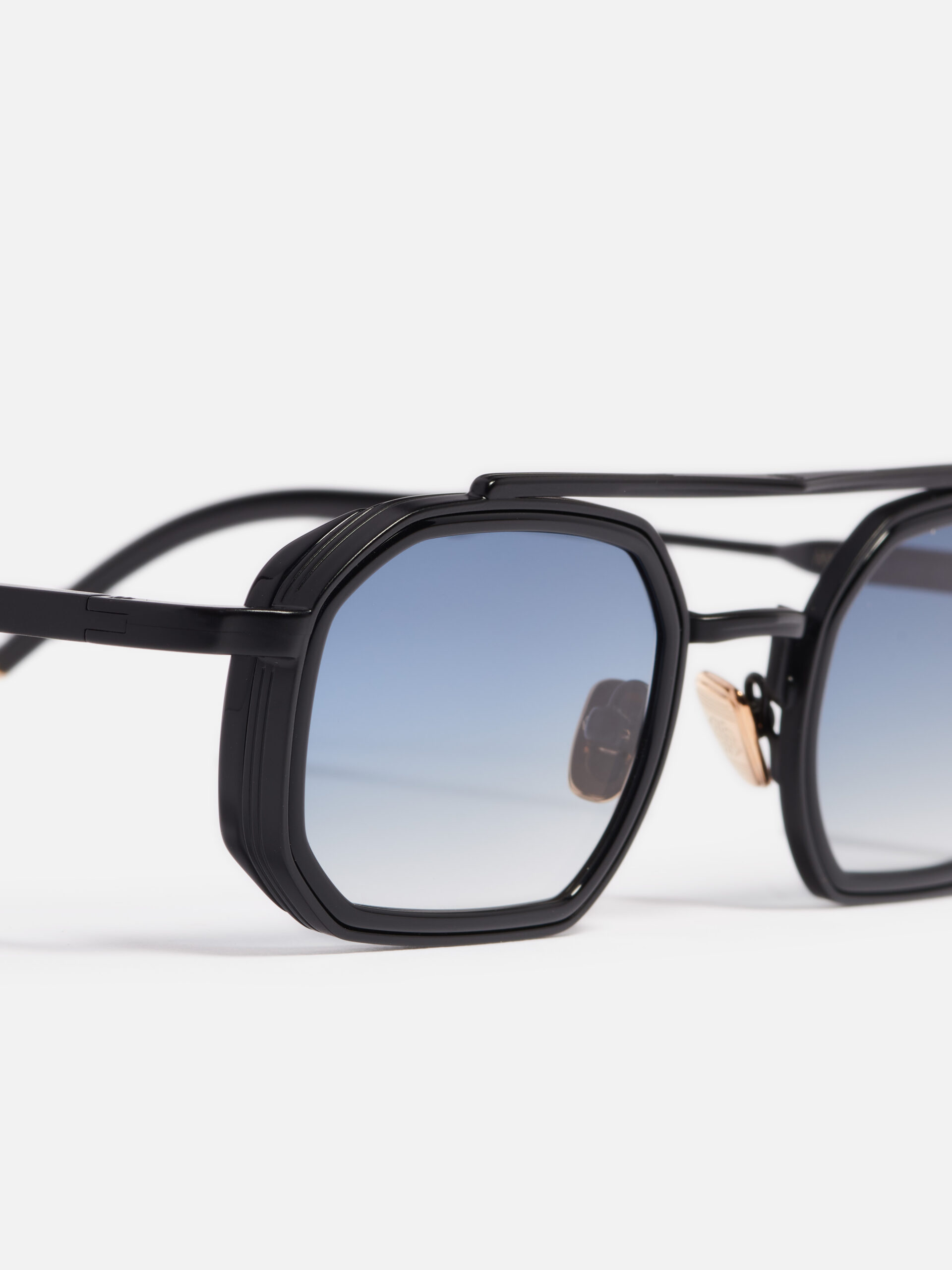 Sunglasses Model Anthony in C303 with light blue gradient lenses from John Dalia