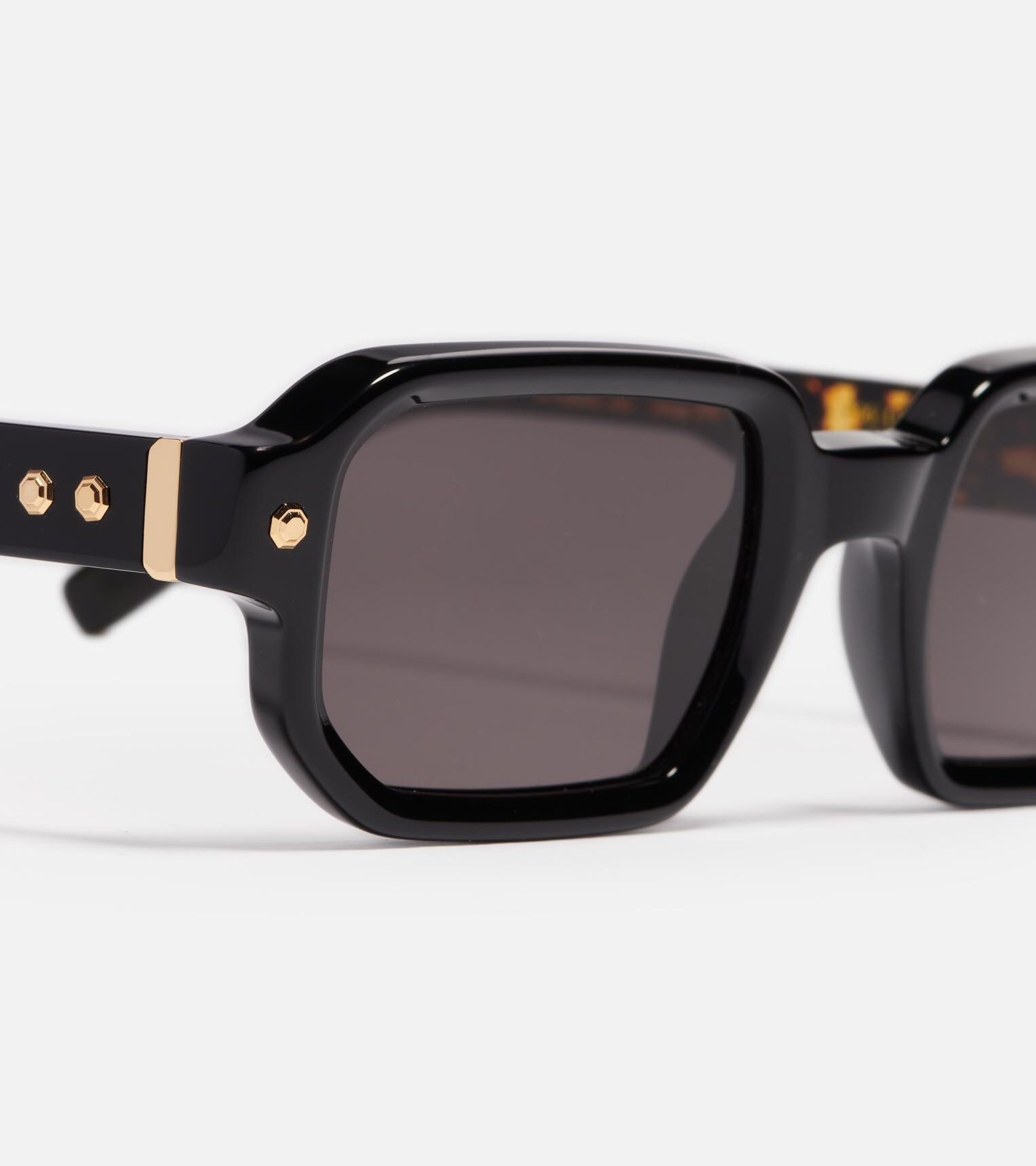Sunglasses Model Project06 in C108 with solid black gradient lenses from John Dalia