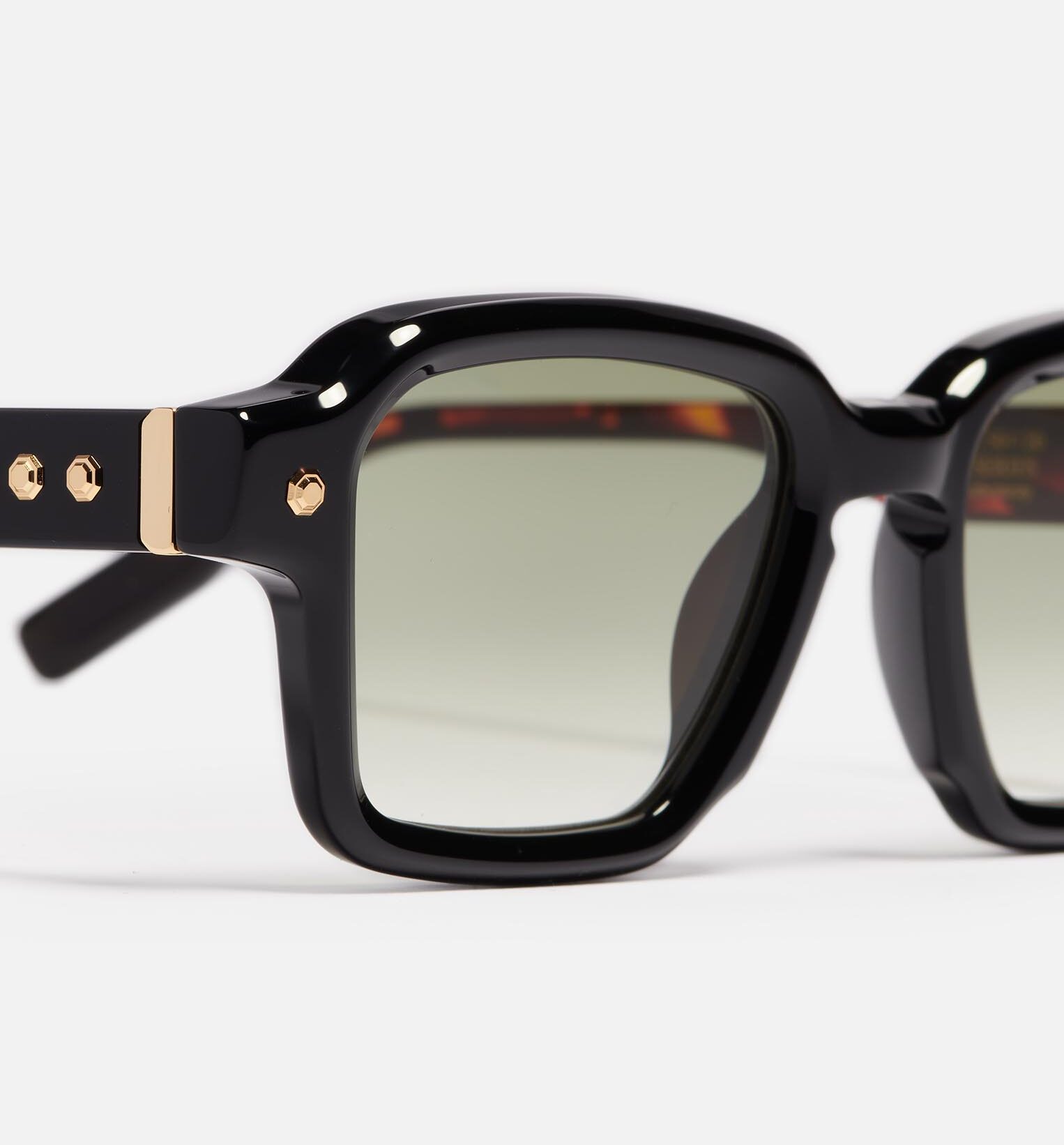 Sunglasses Model Project07 in C106 with clear green gradient lenses from John Dalia