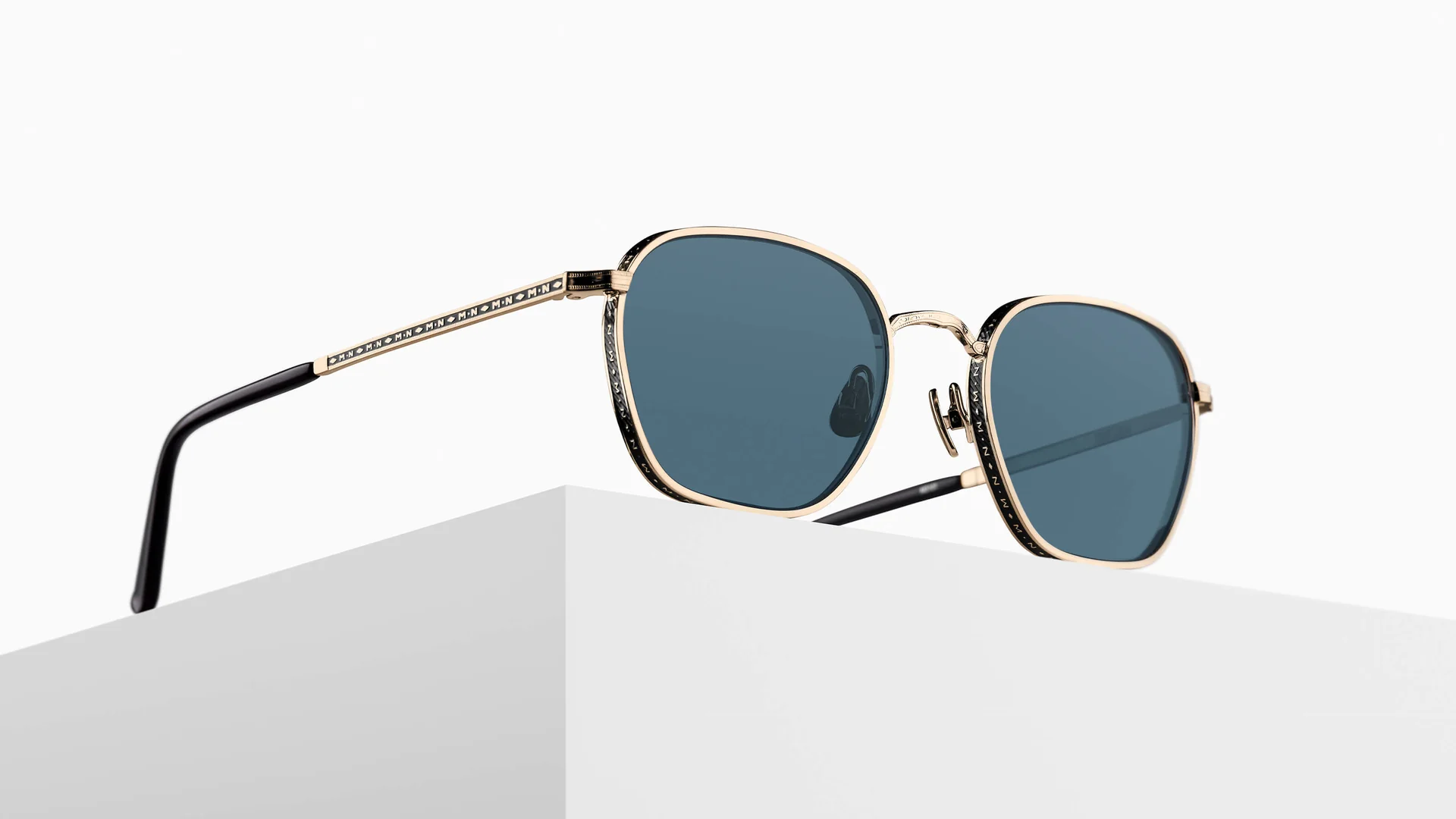 Sunglasses Matsuda model M3101 in Color Brushed Gold and Matte Black with Blue Grey CR39 Lenses