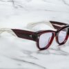 Sunglasses model Chelsea in color Cherry with Lavender lenses from Jacques Marie Mage