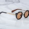 Sunglasses Model Delage in Color Noir X with Orange lenses from Jacques Marie Mage