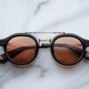 Sunglasses Model Delage in Color Noir X with Orange lenses from Jacques Marie Mage