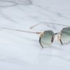 Sunglasses Model El Dorado in color Electrum with Emerald Gradient Lenses from Jacques Marie Mage