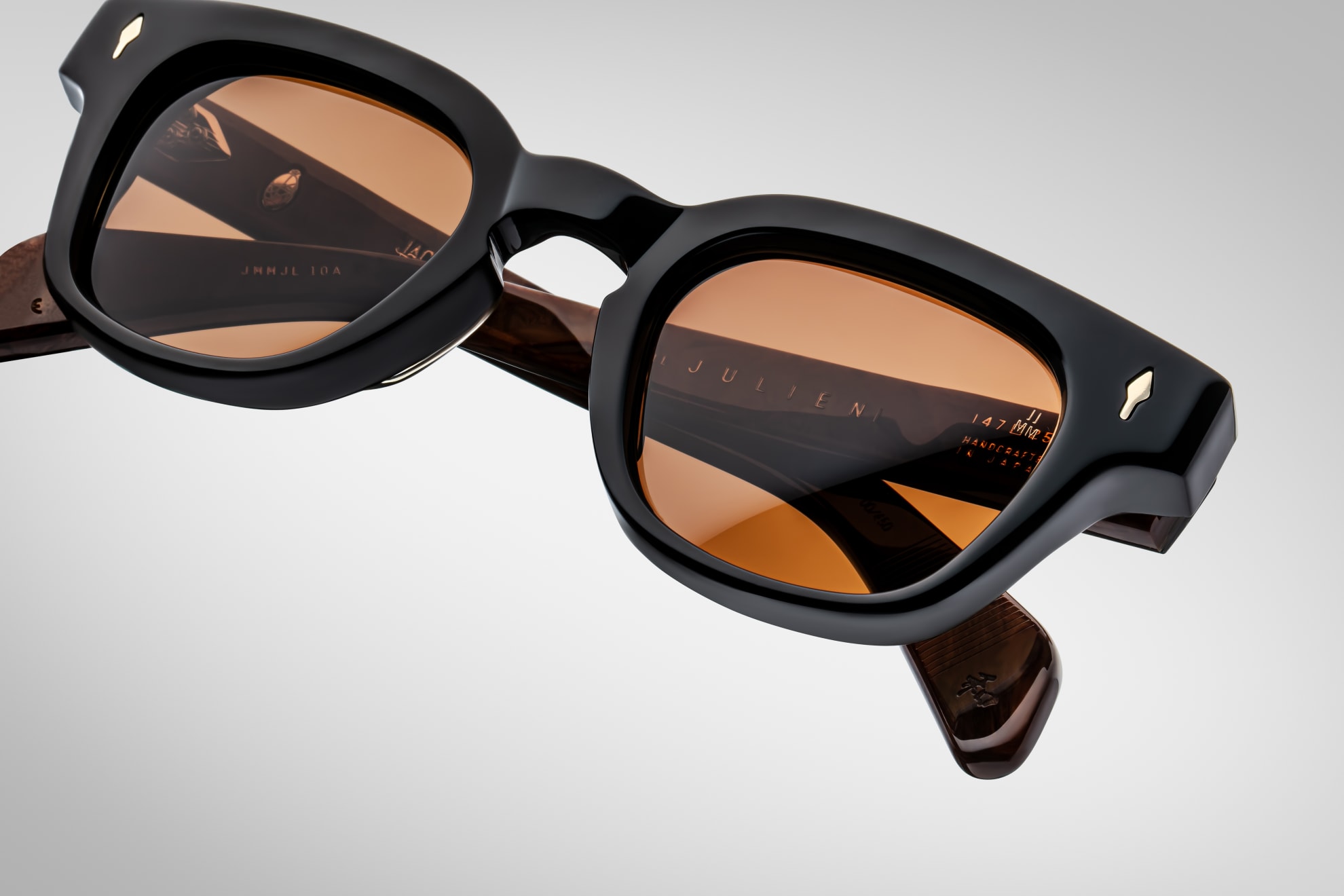 Sunglasses Model Julien in Color Noir X With Orange lenses from Jacques Marie Mage