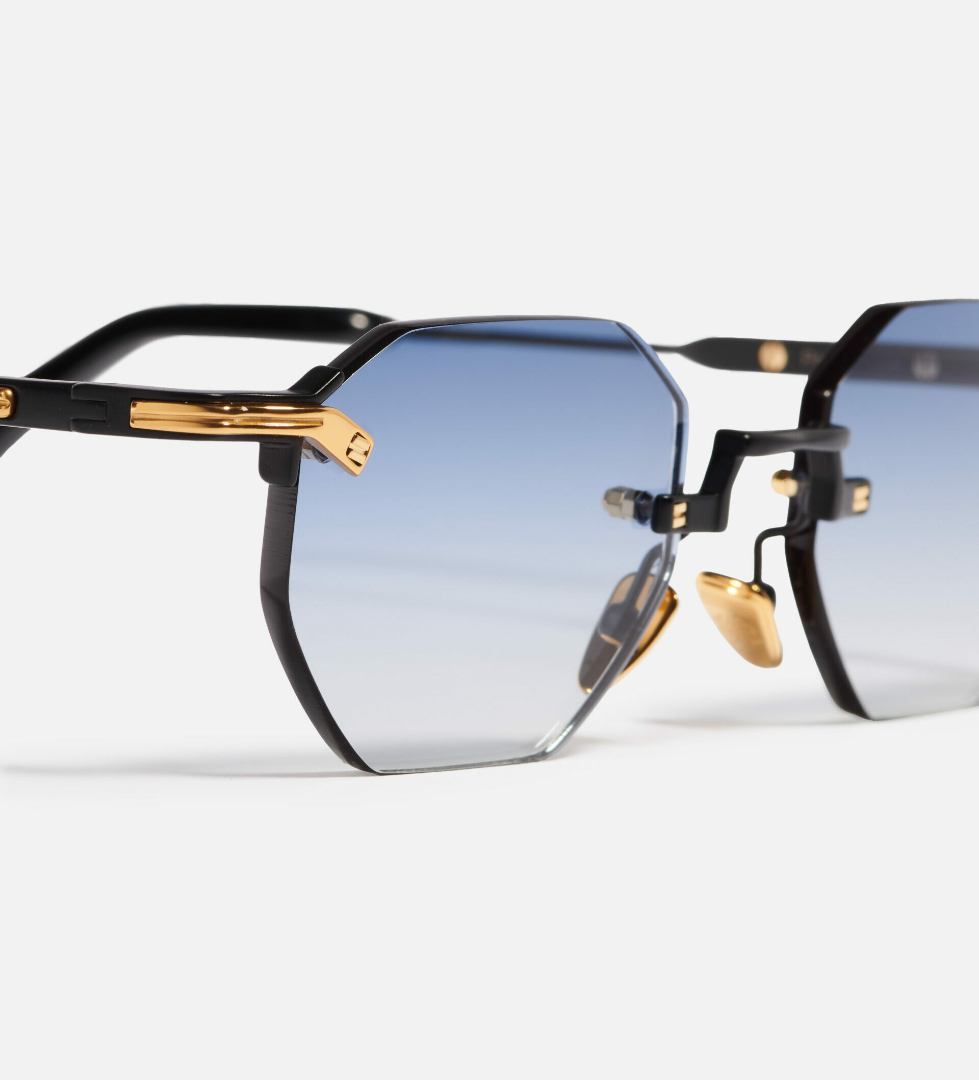 Sunglasses Model Curtis in Color C454 with Light Blue Gradient lenses from John Dalia