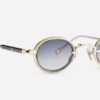 Sunglasses from Sato Eyewear collection Model Algedi-T in Color Lunar Gold and Platinium with Gradient Blue Grey lenses