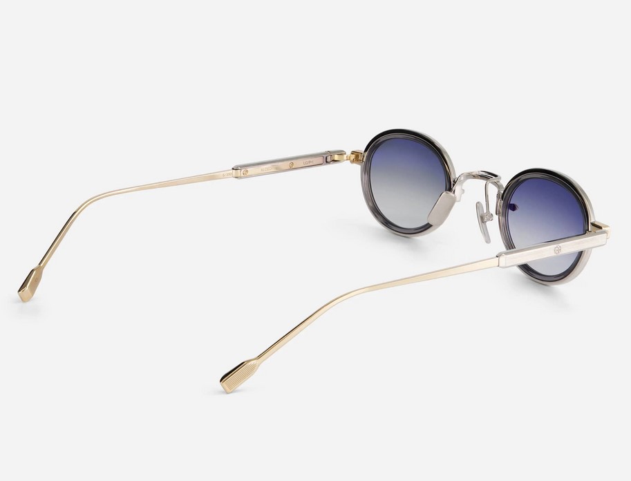 Sunglasses from Sato Eyewear collection Model Algedi-T in Color Lunar Gold and Platinium with Gradient Blue Grey lenses