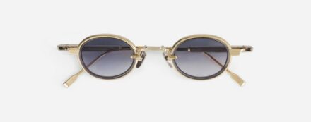 Sunglasses from Sato Eyewear collection Model Algedi-T in Color Lunar Gold and Platinium with Gradient Blue Grey lenses