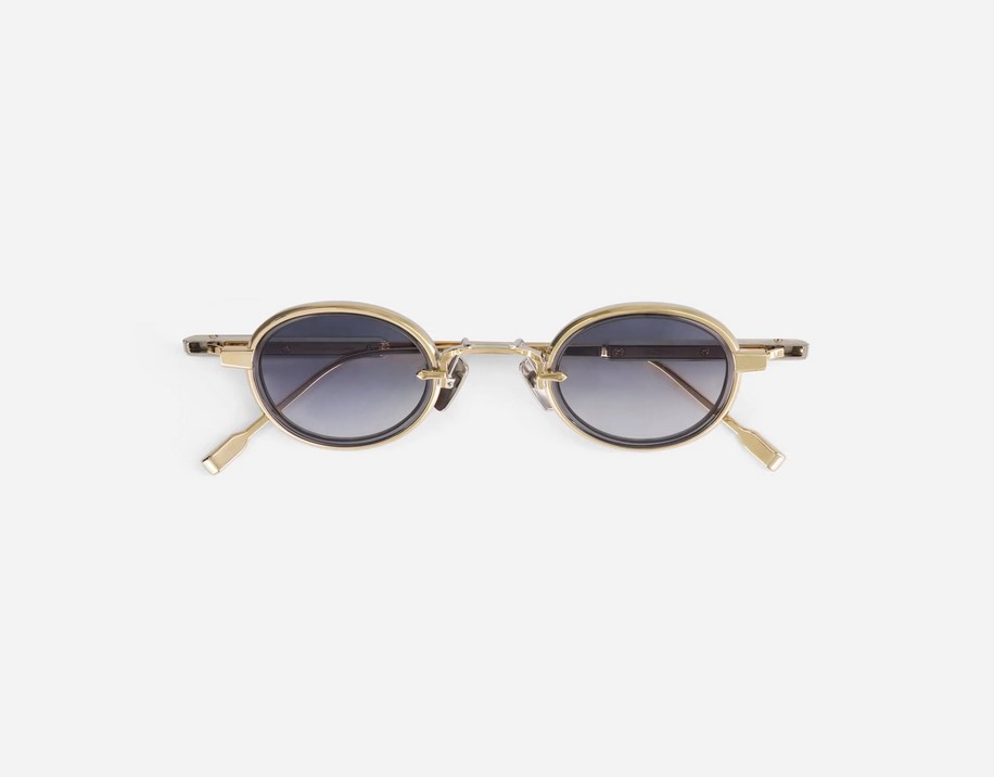 Sunglasses from Sato Eyewear collection Model Algedi-T in Color Lunar Gold and Platinium with Gradient Blue Grey lenses