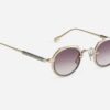 Sunglasses from Sato Eyewear collection Model Revati-T in Color Lunar Gold and Crystal with Gradient Grey lenses