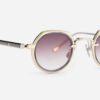 Sunglasses from Sato Eyewear collection Model Revati-T in Color Lunar Gold and Crystal with Gradient Grey lenses
