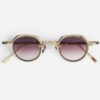 Sunglasses from Sato Eyewear collection Model Revati-T in Color Lunar Gold and Crystal with Gradient Grey lenses