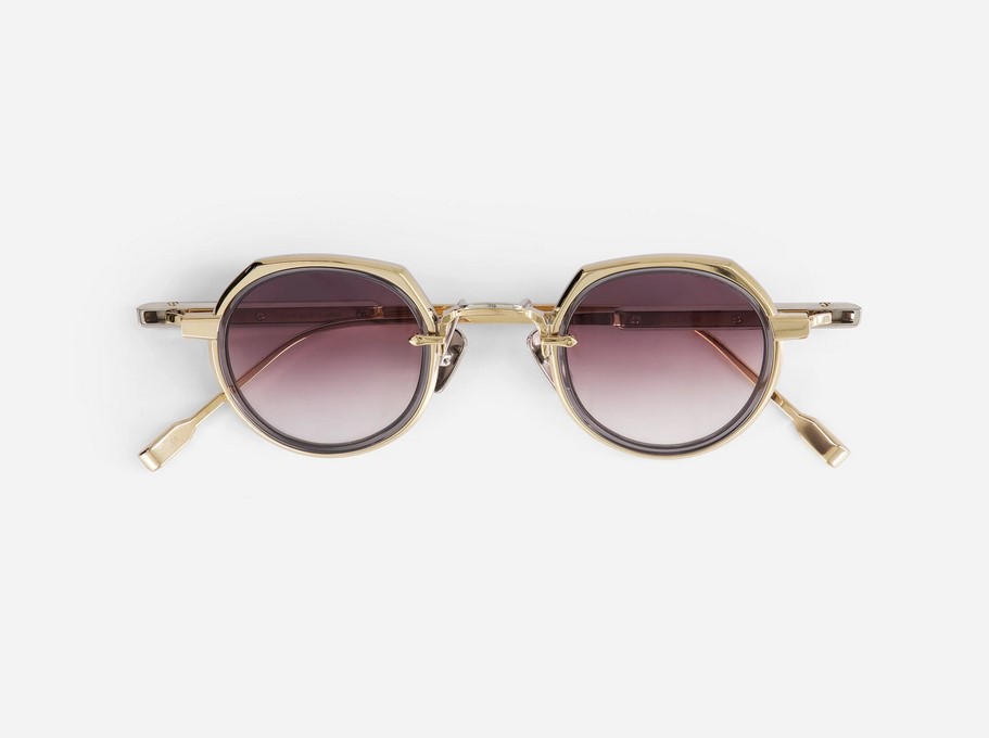 Sunglasses from Sato Eyewear collection Model Revati-T in Color Lunar Gold and Crystal with Gradient Grey lenses