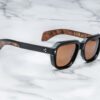 Sunglasses Model Taos in Color Noir X with Orange lenses from Jacques Marie Mage
