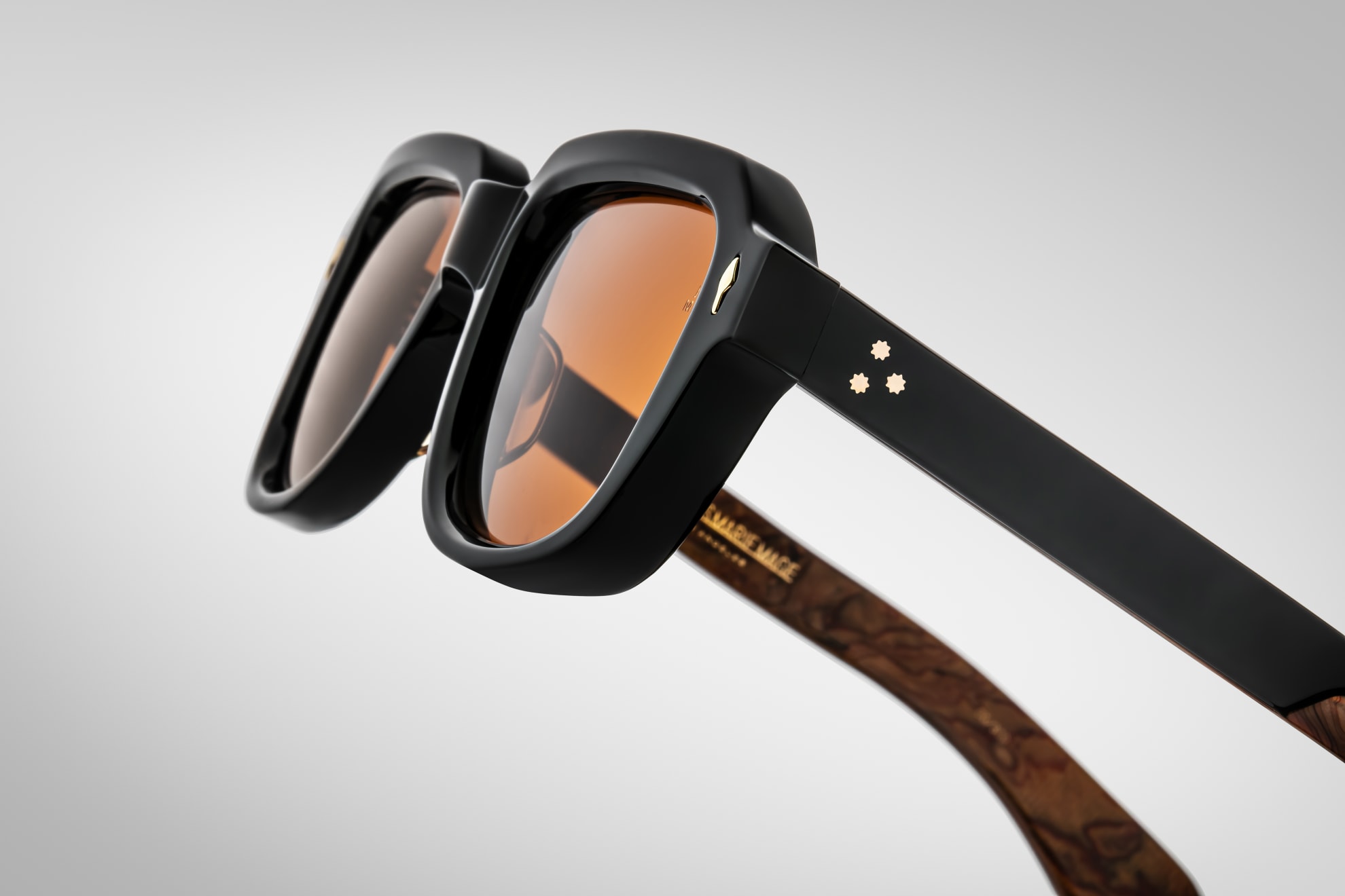 Sunglasses Model Taos in Color Noir X with Orange lenses from Jacques Marie Mage