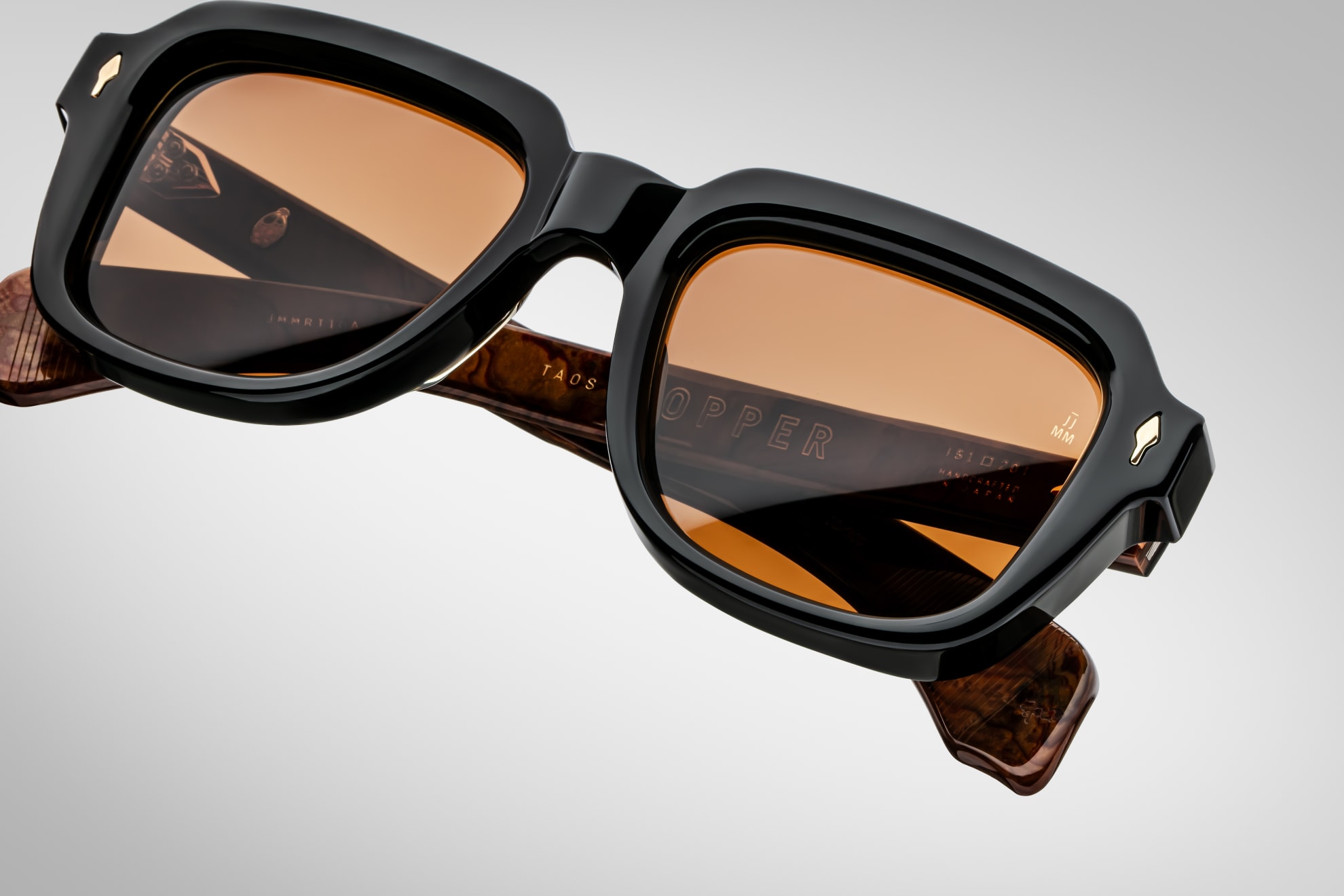 Sunglasses Model Taos in Color Noir X with Orange lenses from Jacques Marie Mage