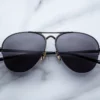 Sunglasses Model Amelia in Color Black with Charcoal Armorlite lenses from Jacques Marie Mage