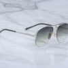 Sunglasses model Amelia in color Viper with Emerald Gradient Armorlite lenses from Jacques Marie Mage