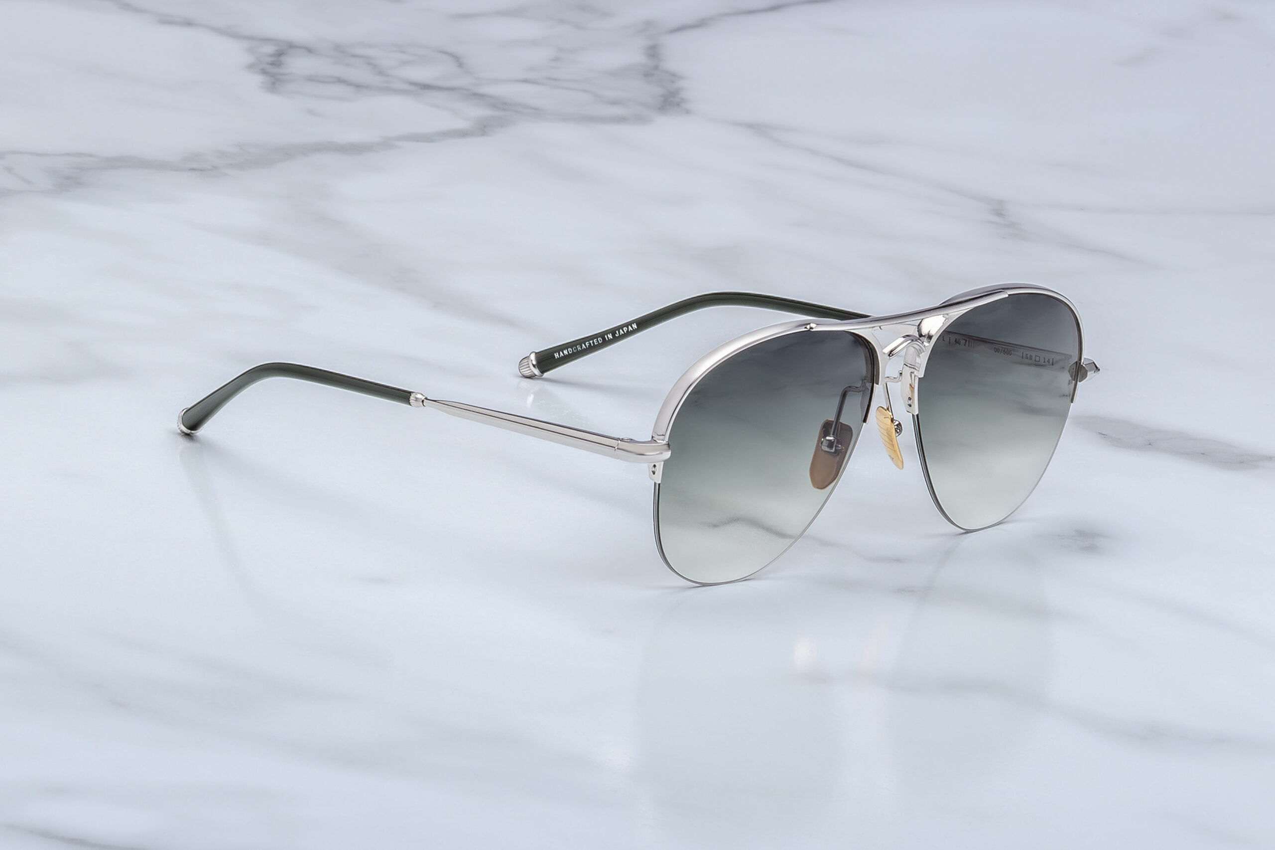 Sunglasses model Amelia in color Viper with Emerald Gradient Armorlite lenses from Jacques Marie Mage