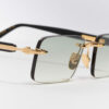 Sunglasses Model R01 in Color C501 with Clear Green Gradient lenses from John Dalia