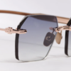 Sunglasses Model R03 in Color C476 with grey Gradient lenses from John Dalia
