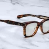 Optical Frame Model Herbie in color Argyle with Sueprlight Bronze lenses from JAcques Marie Mage's Blue Note collection