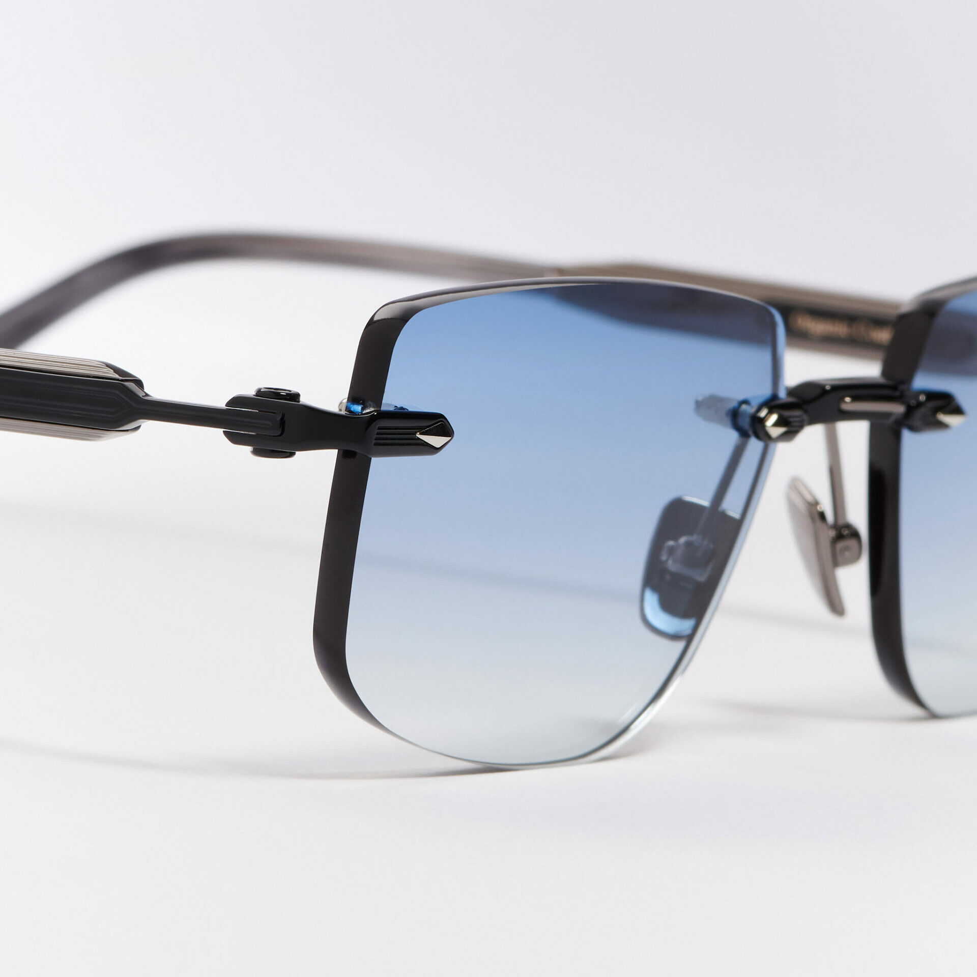 Sunglasses Model R04 in Color C426 with Clear Blue Gradient lenses from John Dalia