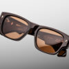 Sunglasses Model Dino in color Walnut with Orange lenses from Jacques Marie Mage