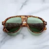 Sunglasses Model Donnybrook in color Vintage Tortoise with Vintage Green lenses from Jacques Marie Mage