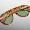 Sunglasses Model Donnybrook in color Vintage Tortoise with Vintage Green lenses from Jacques Marie Mage
