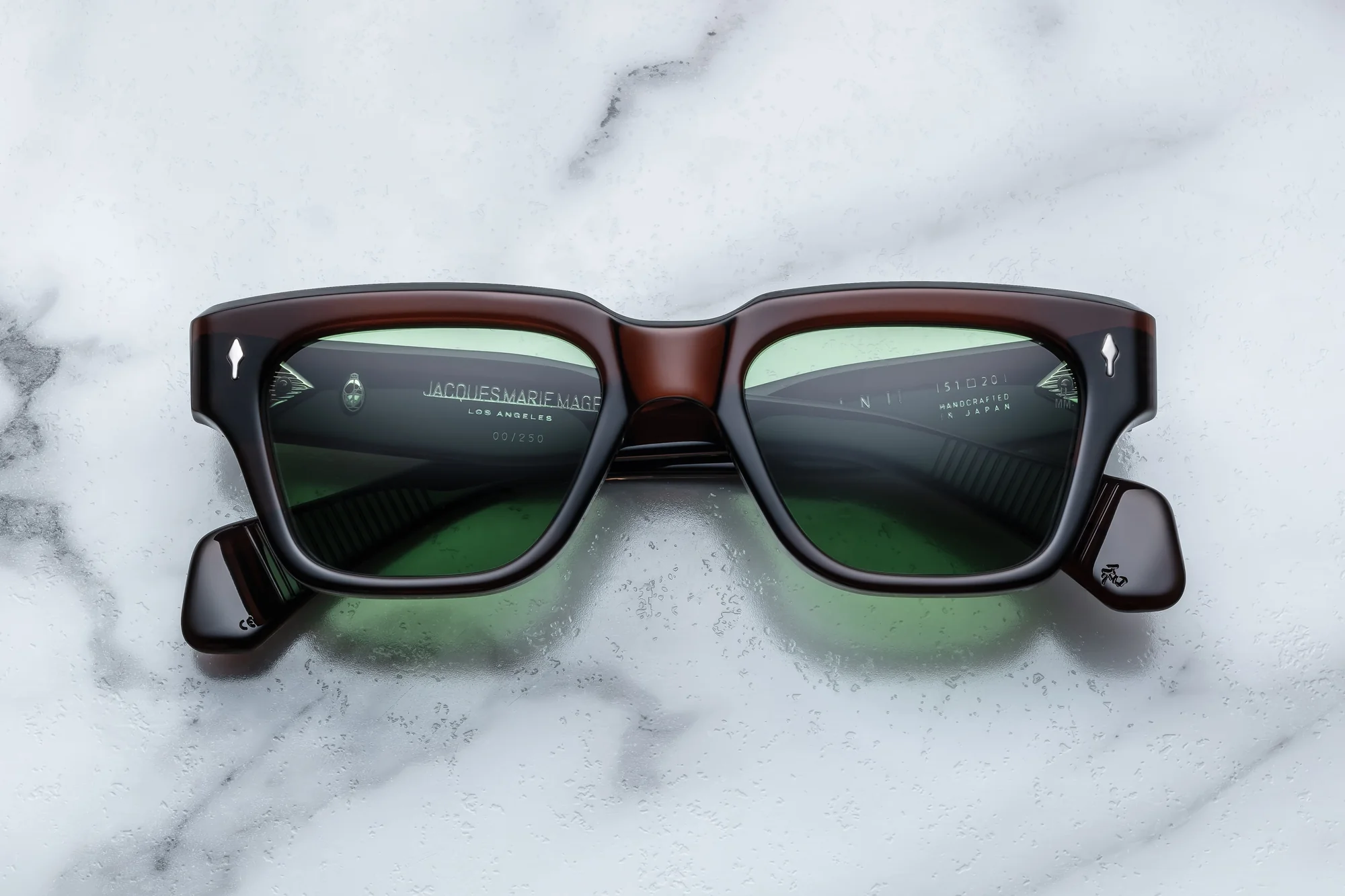 Sunglasses from the brand Jacques Marie Mage mpodel Fellini in the color Zoltar with green lenses - buy online or in shop in Liège Belgium