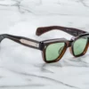 Sunglasses from the brand Jacques Marie Mage mpodel Fellini in the color Zoltar with green lenses - buy online or in shop in Liège Belgium
