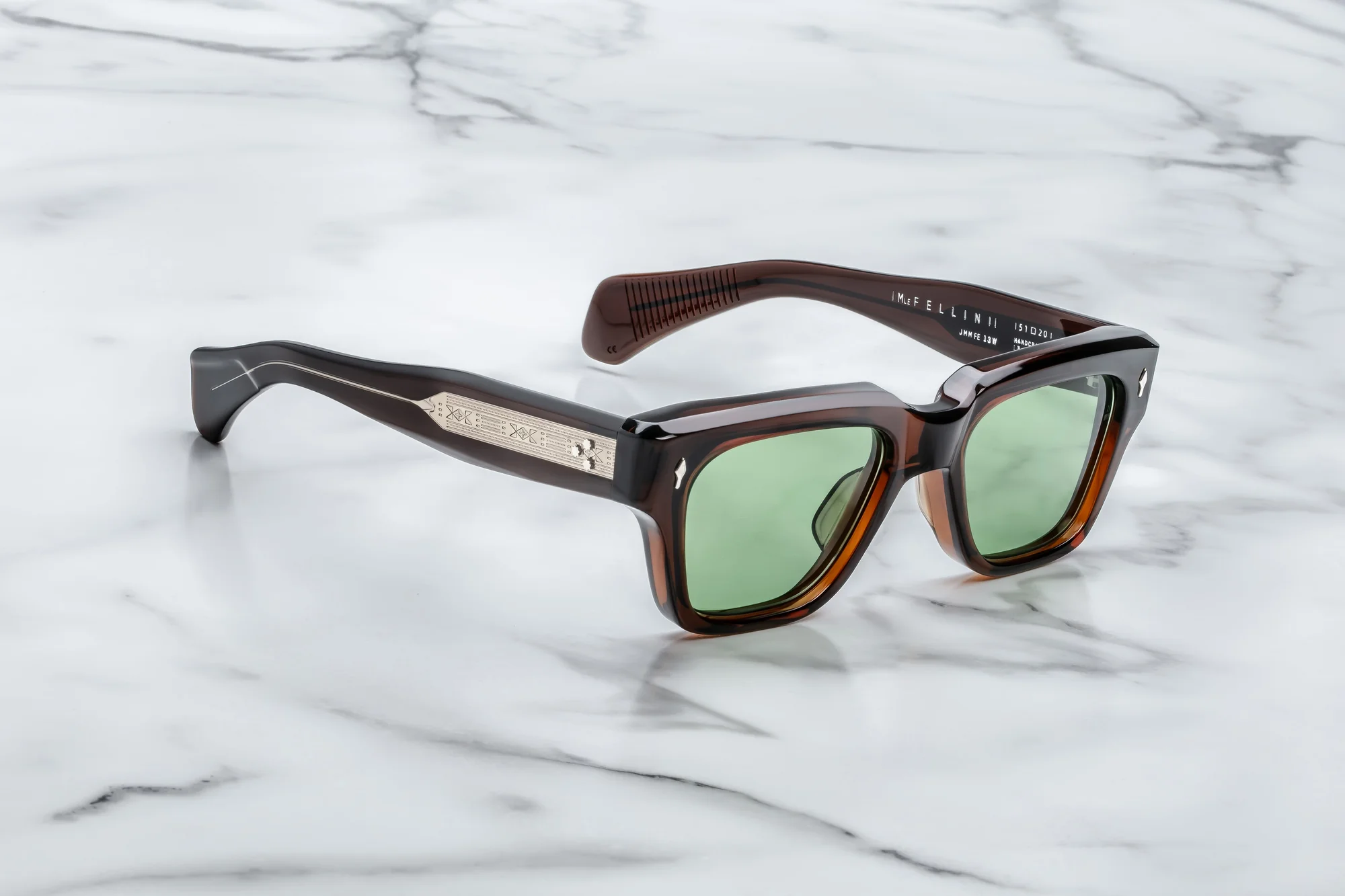 Sunglasses from the brand Jacques Marie Mage mpodel Fellini in the color Zoltar with green lenses - buy online or in shop in Liège Belgium