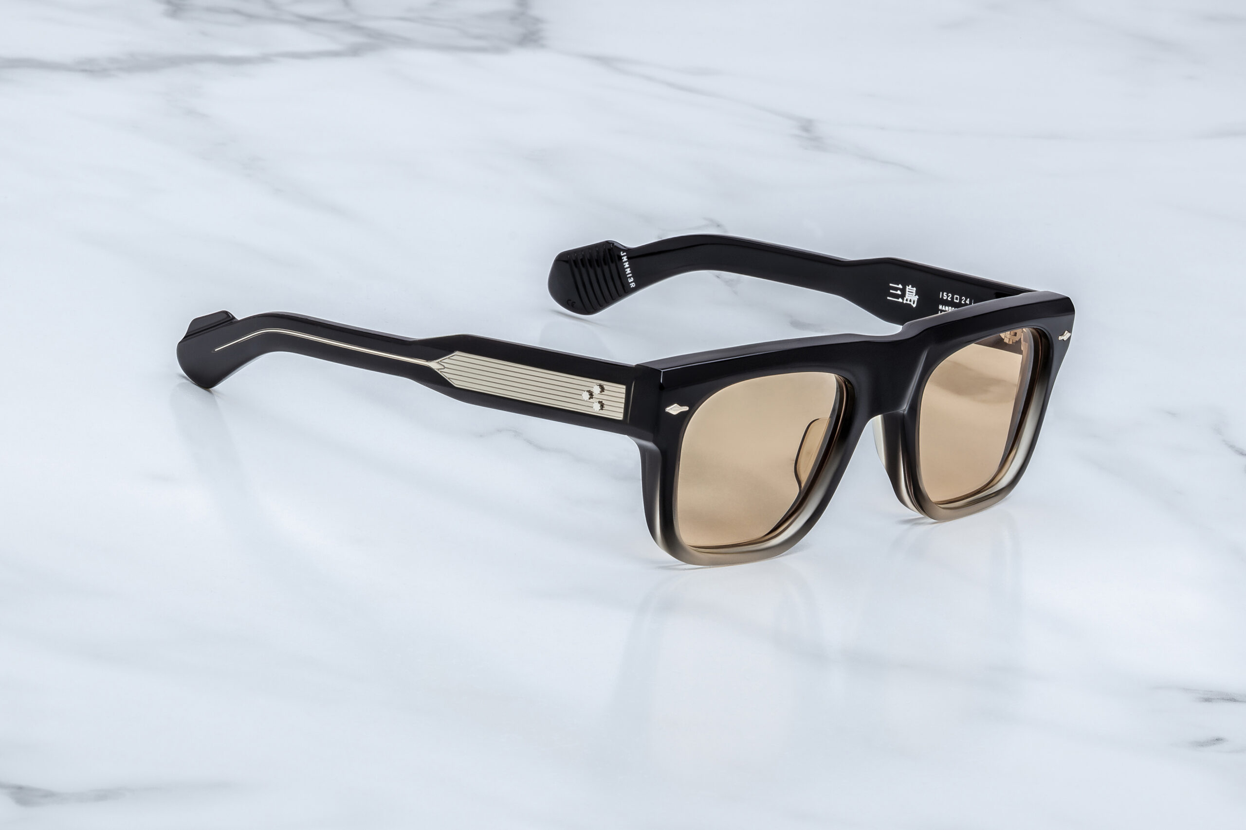 Sunglasses Model Mishima in Color Black Fade with Light Orange lenses from Jacques Marie Mage