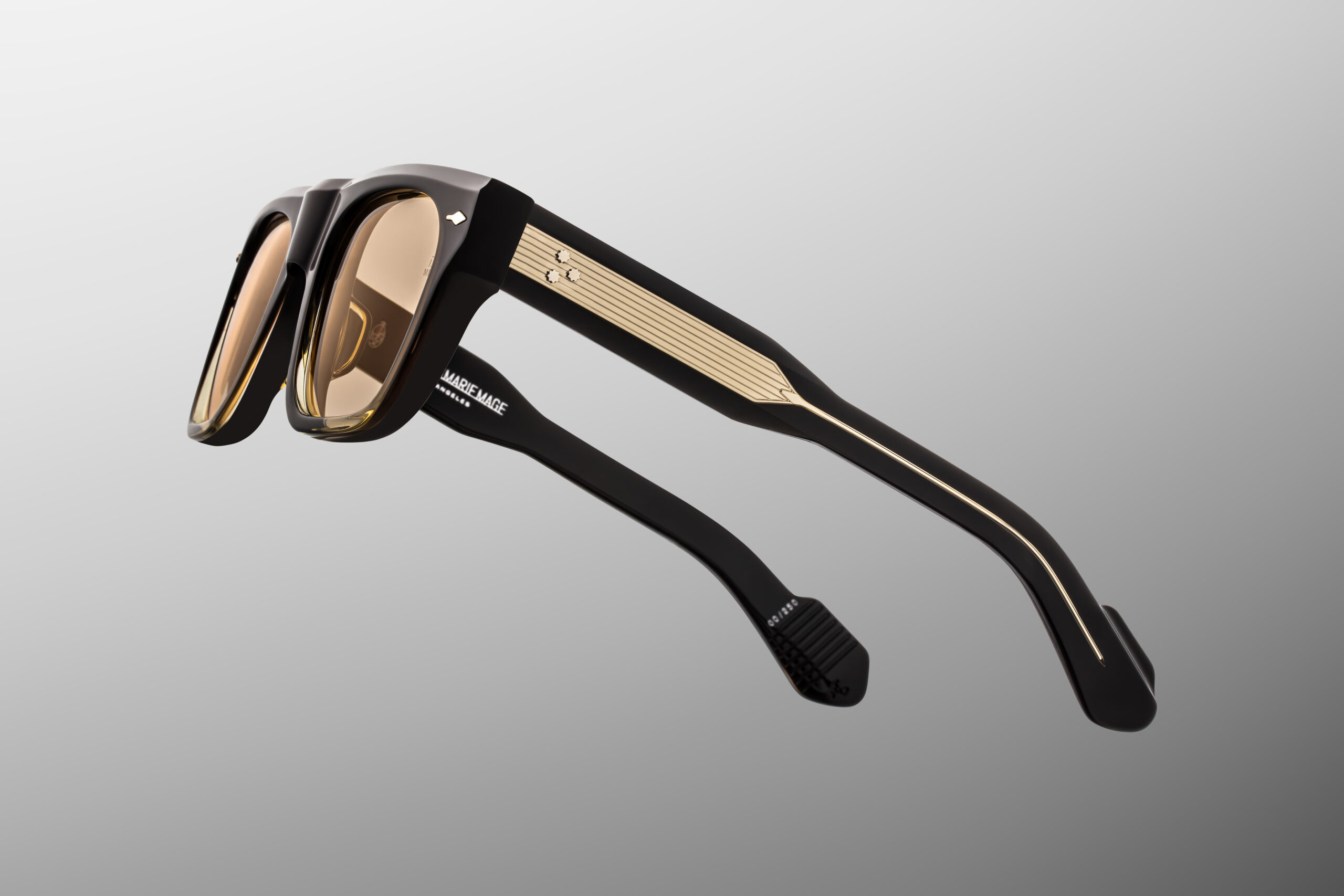 Sunglasses Model Mishima in Color Black Fade with Light Orange lenses from Jacques Marie Mage